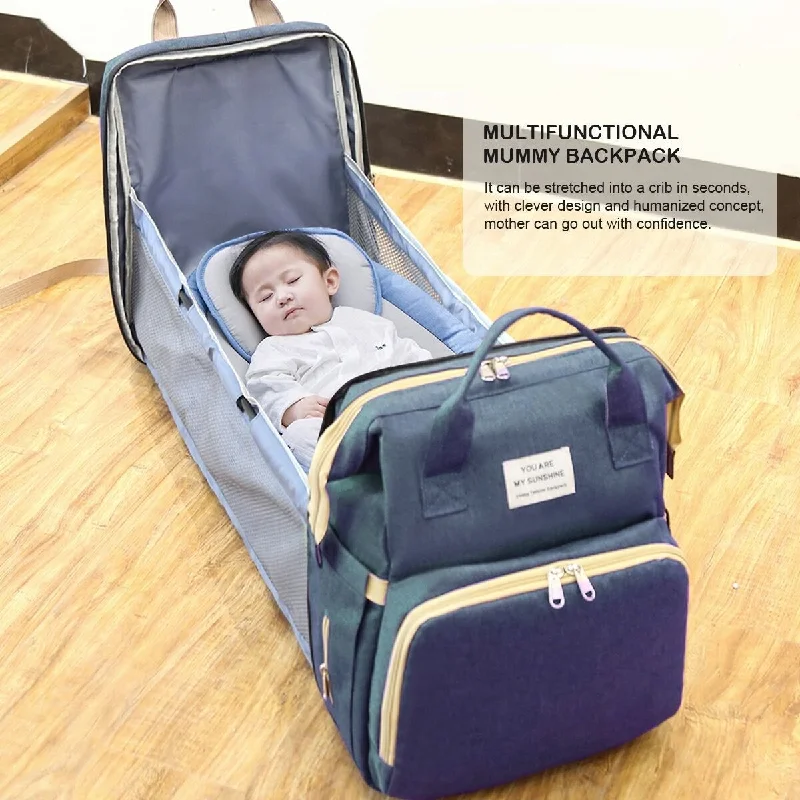 Travel backpack rain covers made of durable nylon materialWaterproof Backpack Large Capacity Travel Diaper Bag with Foldable Crib and USB Charging Port Travel backpack rain covers made of durable nylon materialWaterproof Backpack Large Capacity Travel Diaper Bag with Foldable Crib and USB Charging Port
